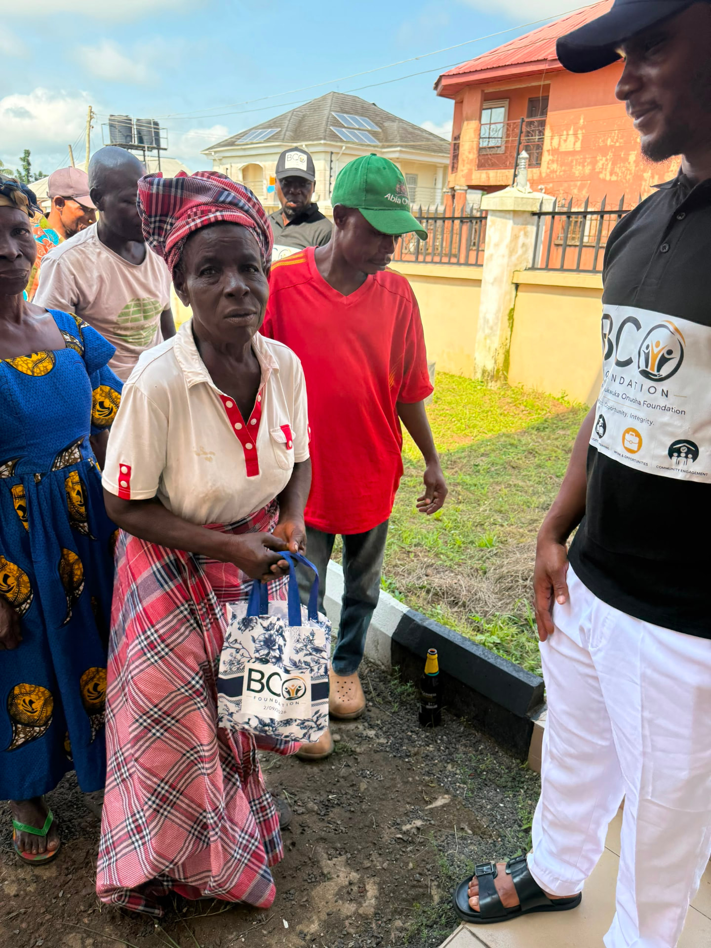 A community member receiving a BCO Foundation relief bag